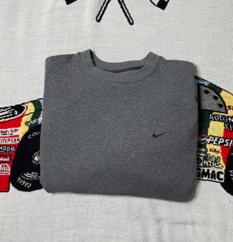 “Nike - Small Swoosh Logo” Sweatshirt