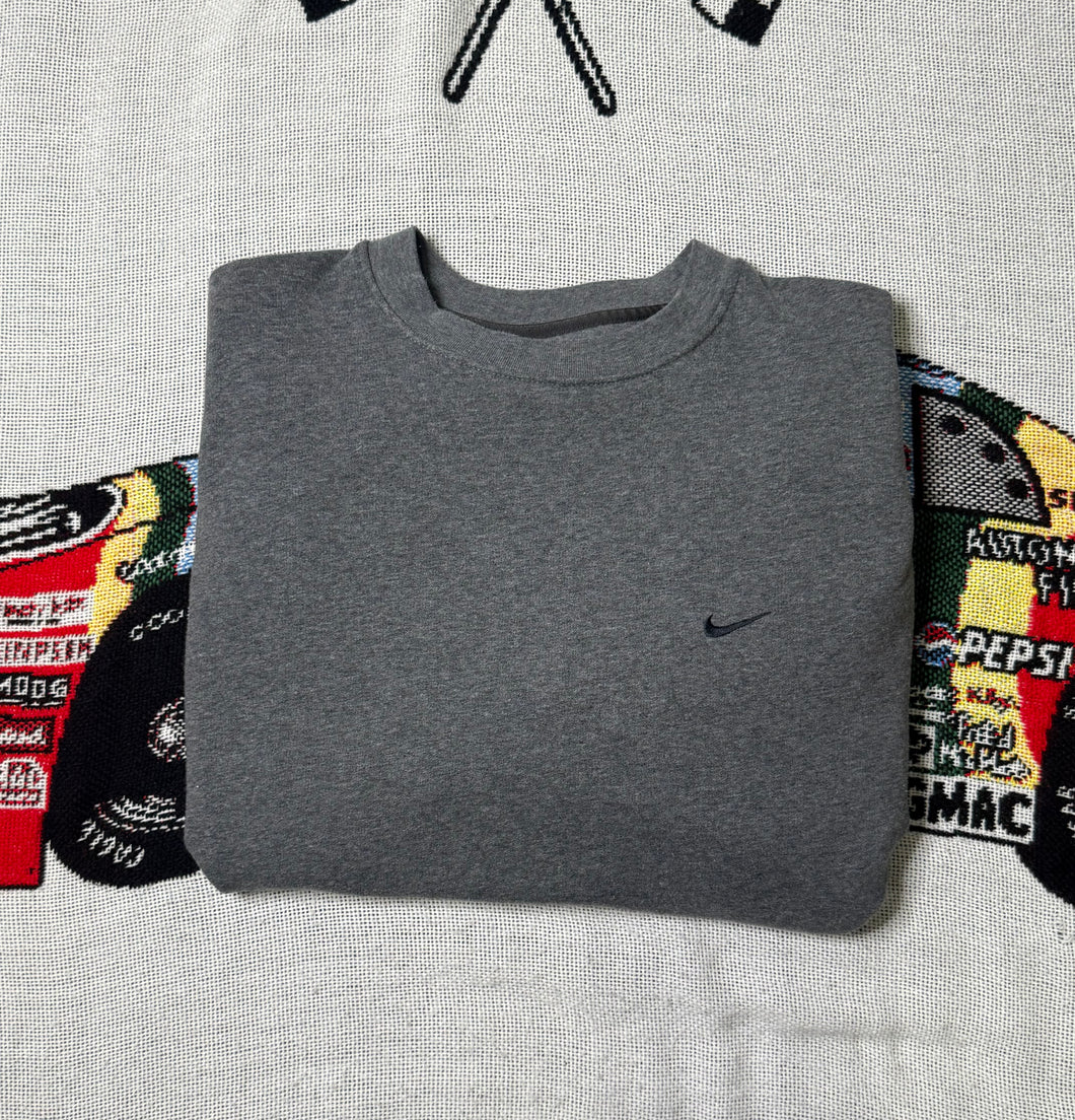 “Nike - Small Swoosh Logo” Sweatshirt